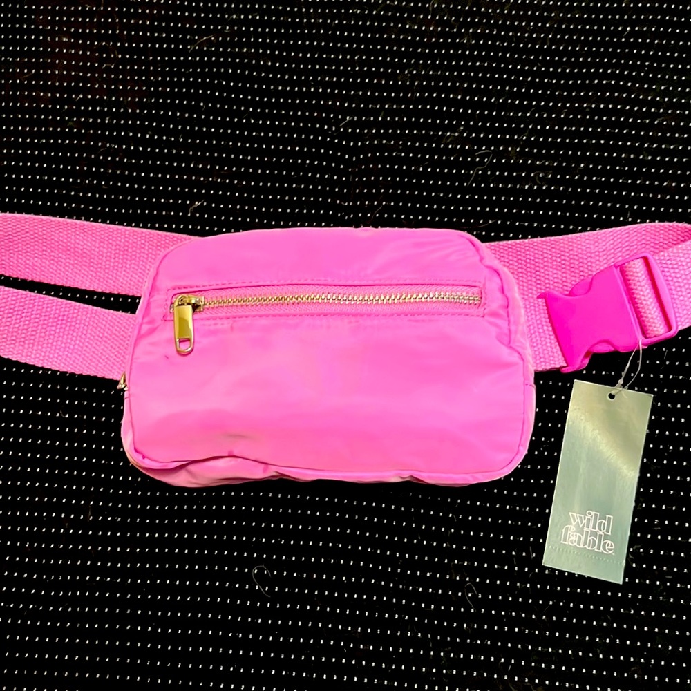 Pink brand new hard to find fanny pack that you can wear crossbody like the lulu